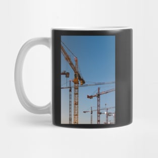 Cranes against clear blue sky Mug